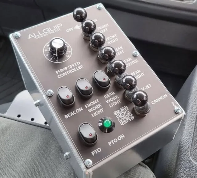 Anodised aluminium control box with laser engraved switch labels and QR code