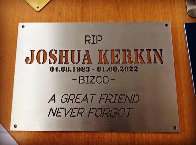 Stainless steel memorial plaque with laser cut out lettering