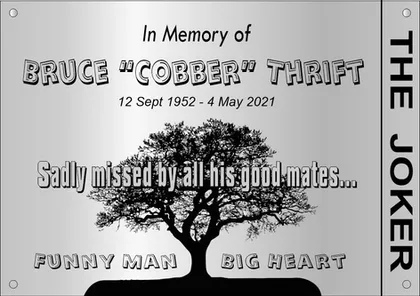 Memorial plaque with a tree design and a nickname