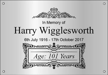 Memorial plaque with an ornate border celebrating 101 years