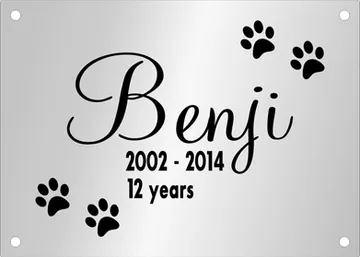 Pet memorial plaque with a script name and paw prints