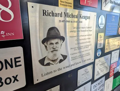 Portrait memorial plaques on display in the Planet Engraving showroom